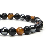 Attraction Zen Armband Dreifacher Schutz - Tigerauge, schwarzer Obsidian, Hämatit | ALLE STEINE IN UNSEREN ARMBÄNDERN SIND NATÜRLICH